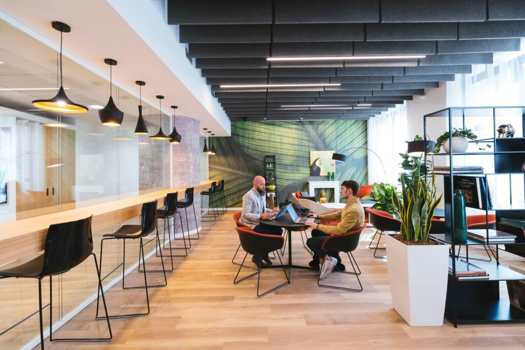 Modern coworking office in London with professionals collaborating in a bright, contemporary workspace